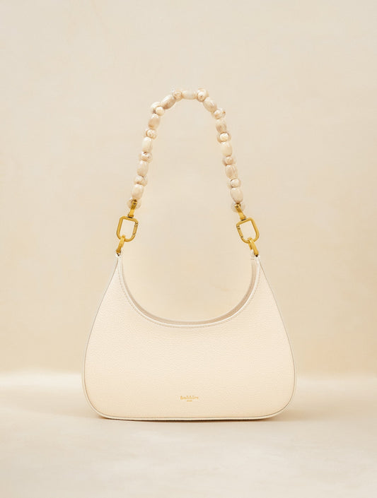 Bobbies Aléria Seafoam handbag — product view on warm studio background