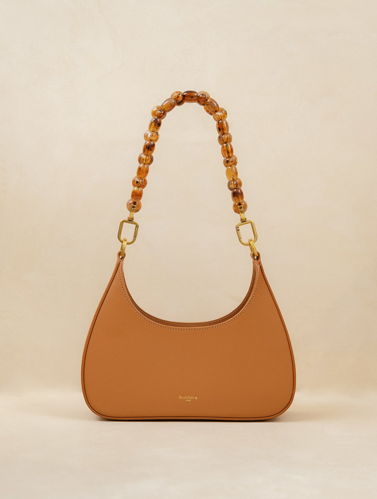 Bobbies Aléria Speculoos handbag — product view on warm studio background