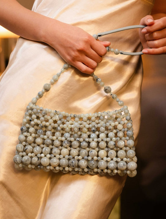 Bobbies Deià Cipollino handbag — worn view